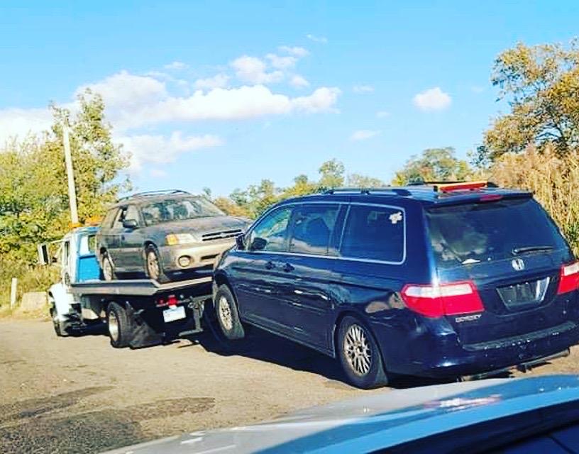 Flatbed carrier serving Norwalk CT vehicle transport customers