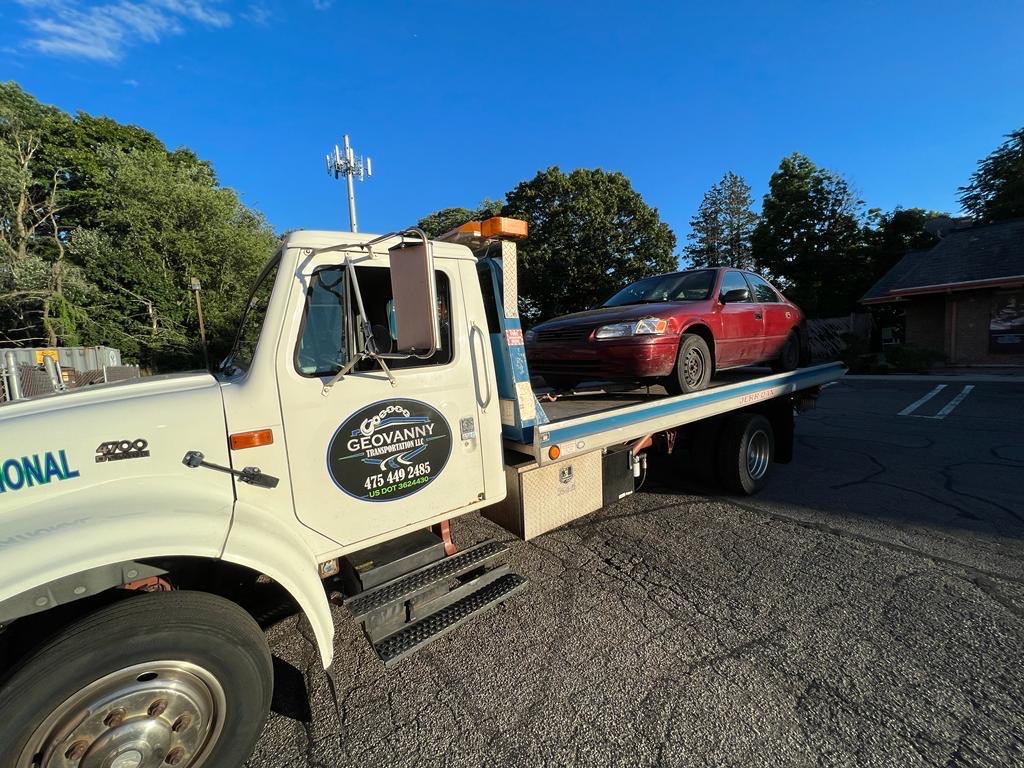 Flatbed carrier serving West Hartford CT vehicle transport customers